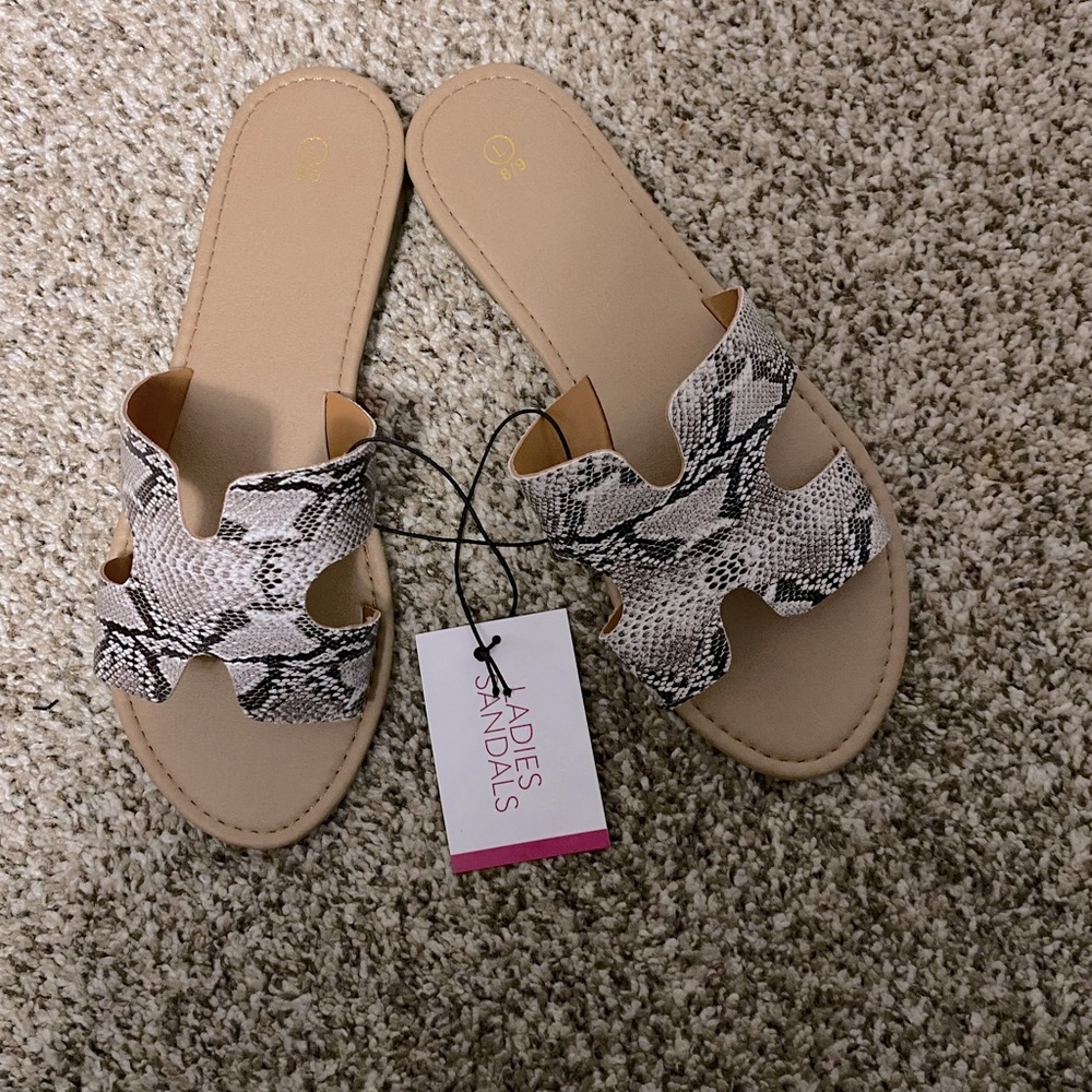 Brand new never worn  ladies snake H- band slides